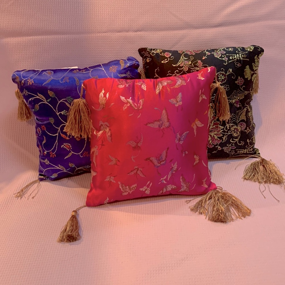 3 silk throw pillows